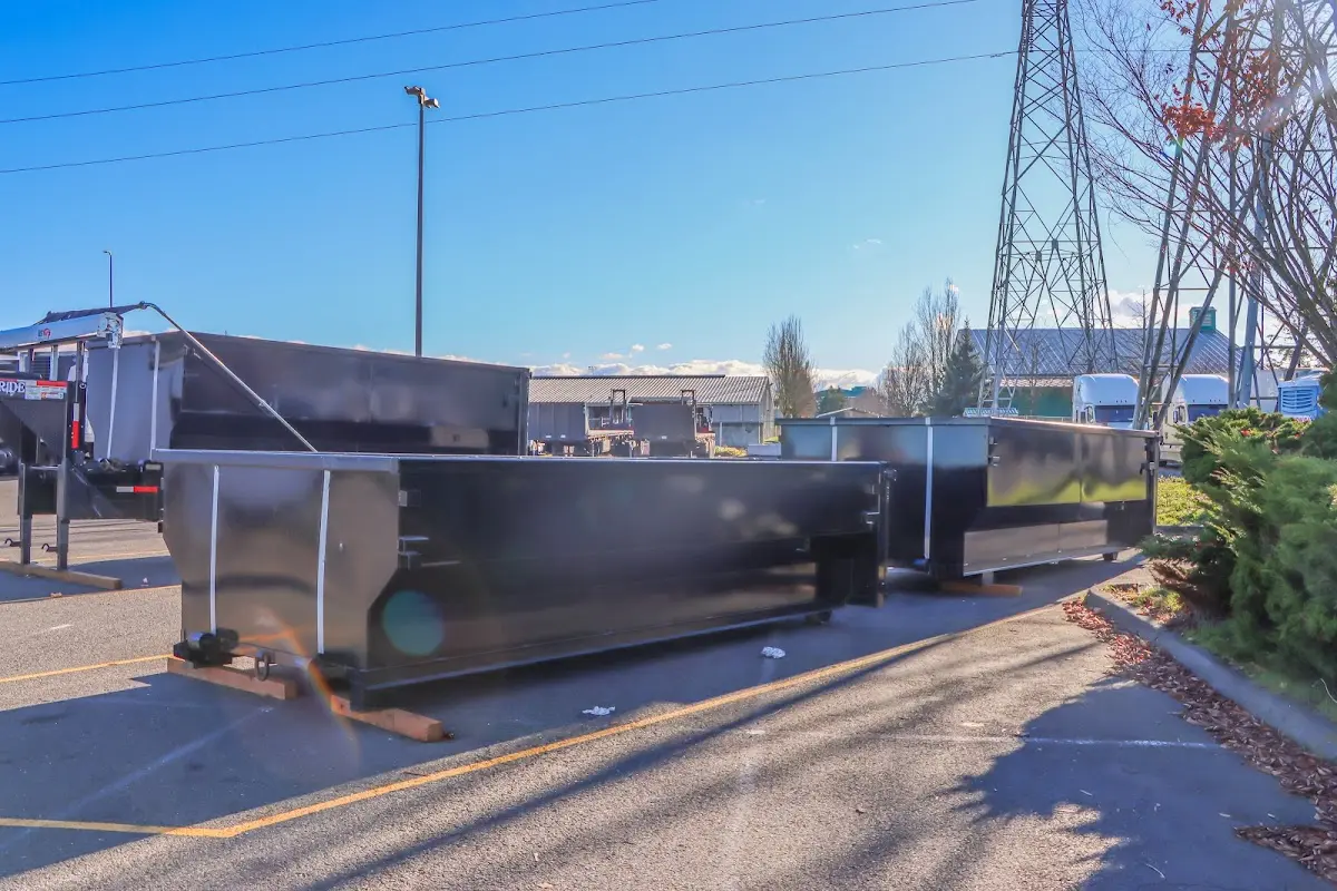 Roll-off dumpster ready for waste disposal at job site for Demolition Dumpster Rental in Doolittle